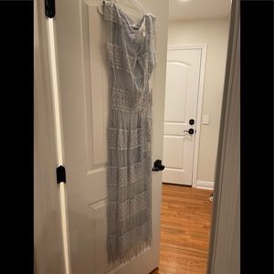 Long baby blue dress.